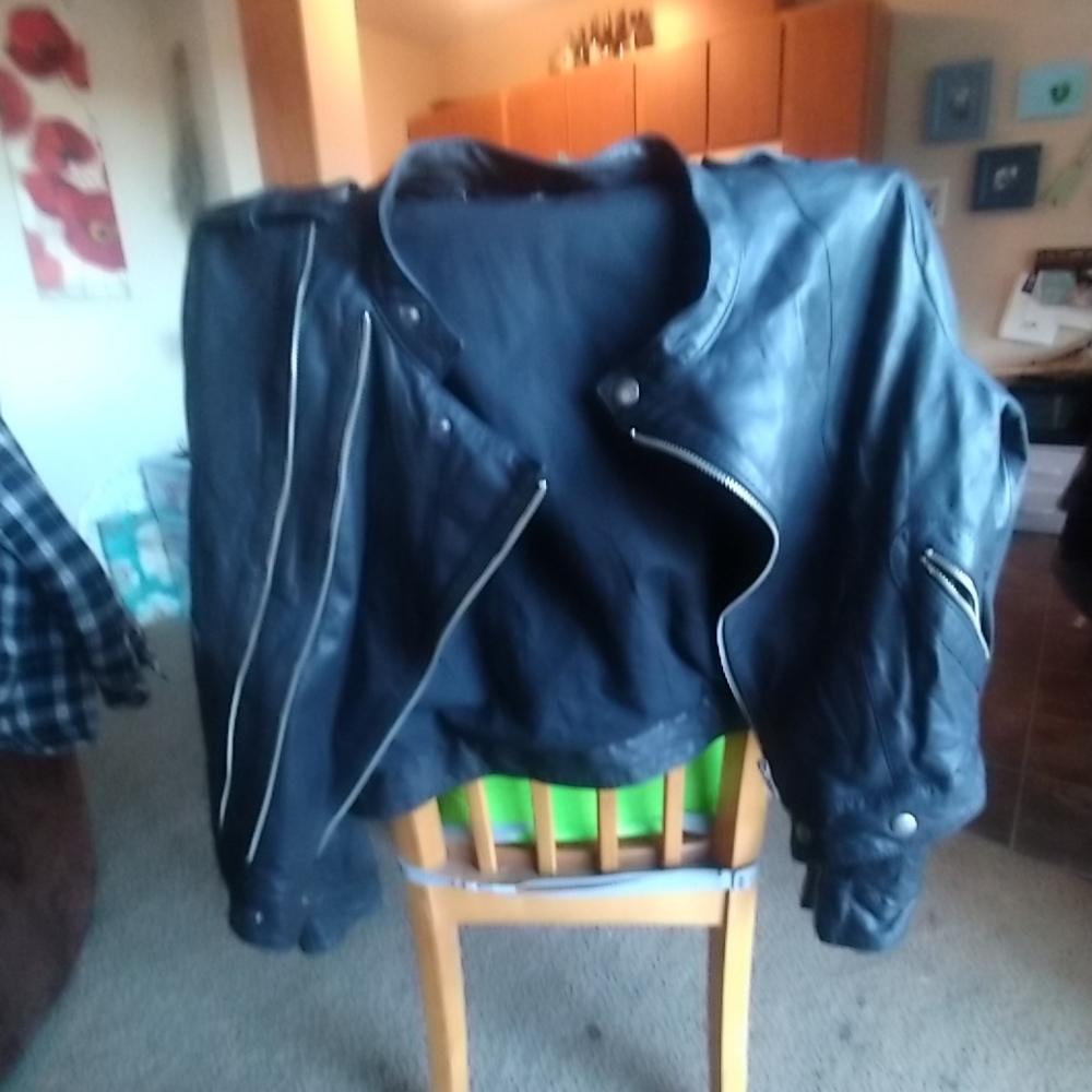 Leather coat. See By Chloe